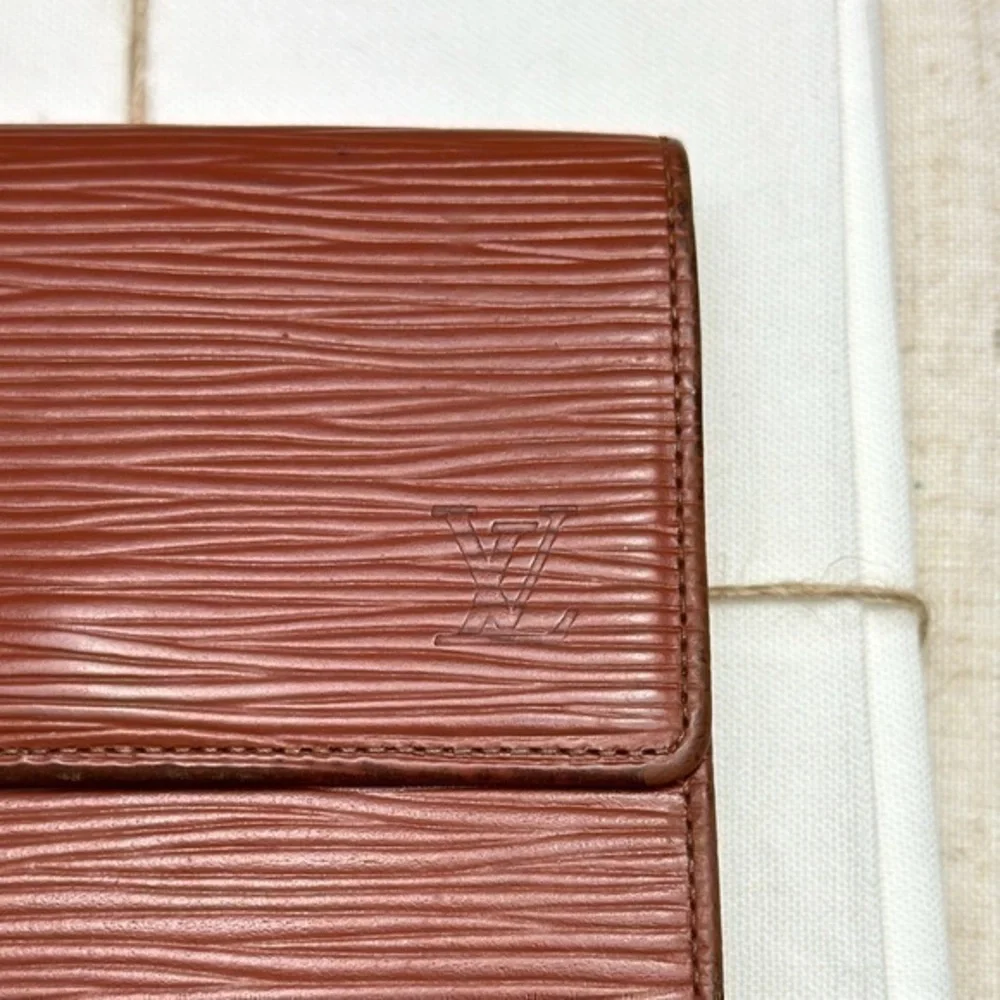 AUTHENTIC Louis Vuitton Marco Wallet. Color: Brown.